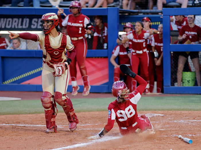 Oklahoma's Jordyn Bahl slides home to score during the sixth inning of Game 2 of the Women's College World Series.